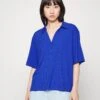 Monki Polo Shirt - Blue Bright 1 Monki Polo Shirt - Blue Bright -Monki Store 1bcdac5bb422443a8182cb627632c45e