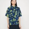 Monki Button-Down Blouse - Button-Down Blouse -Monki Store 42aa3c6c4d654b4aa53bdb3ce60caabd